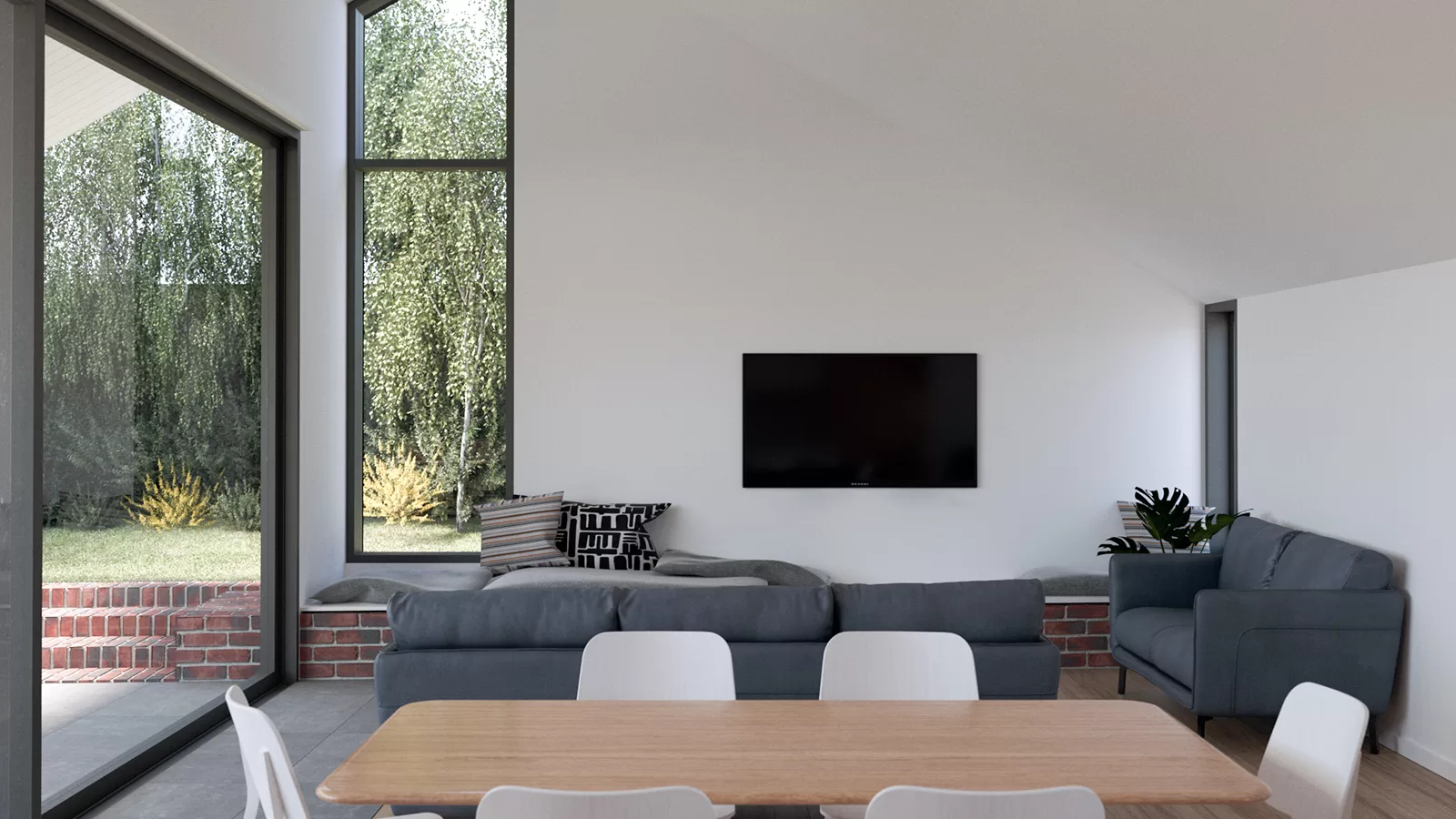Architectural portfolio image of a light-filled interior of a sustainable residential home in Pascoe Vale, featuring modern finishes, brick bench seating, and garden views — designed by MOA.studio