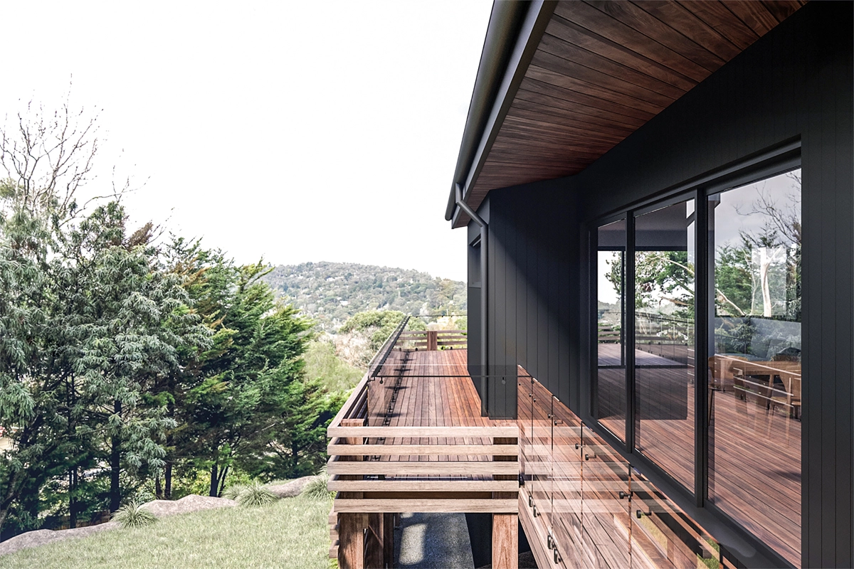 Image of a house renovation in Upper Ferntree Gully, Vic. External view looking out across the timber deck to the valley beyond.