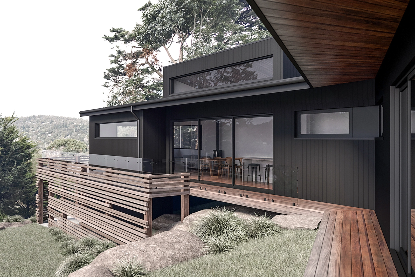 Image of a house renovation in Upper Ferntree Gully, Vic. External view looking out across the timber deck to the living wing.