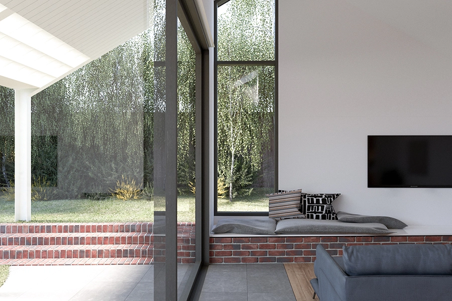 Light-filled interior of a sustainable residential home in Pascoe Vale, featuring modern finishes, brick bench seating, and garden views — designed by MOA.studio